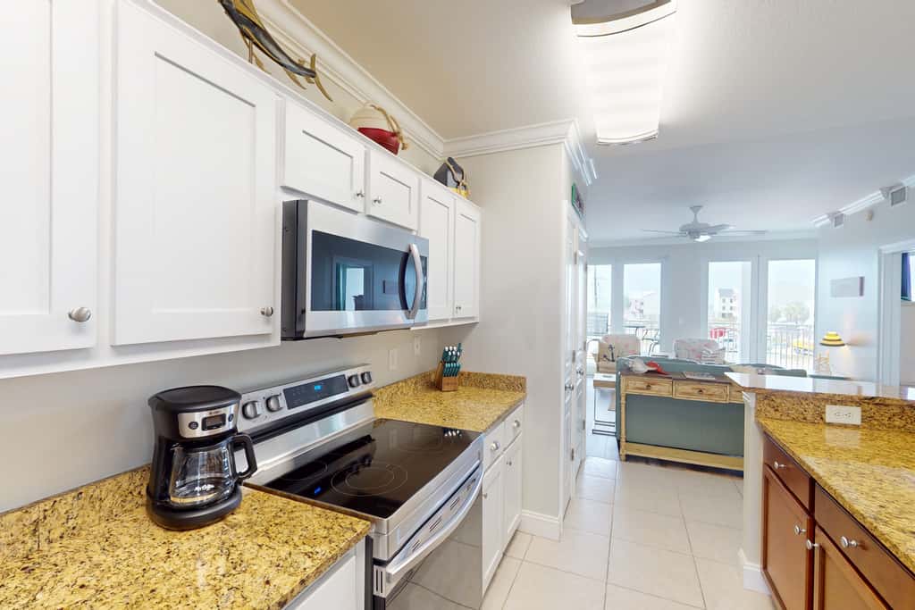 Waterfront condo with pool, hot tub, furnished lanai, fireplace & chic furniture