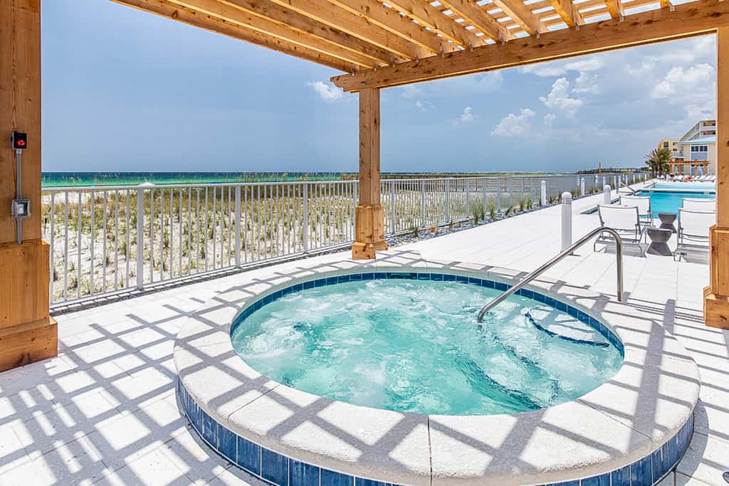 Blu 105 - Gulf-front condo with pools and seasonal beach service in a gated community