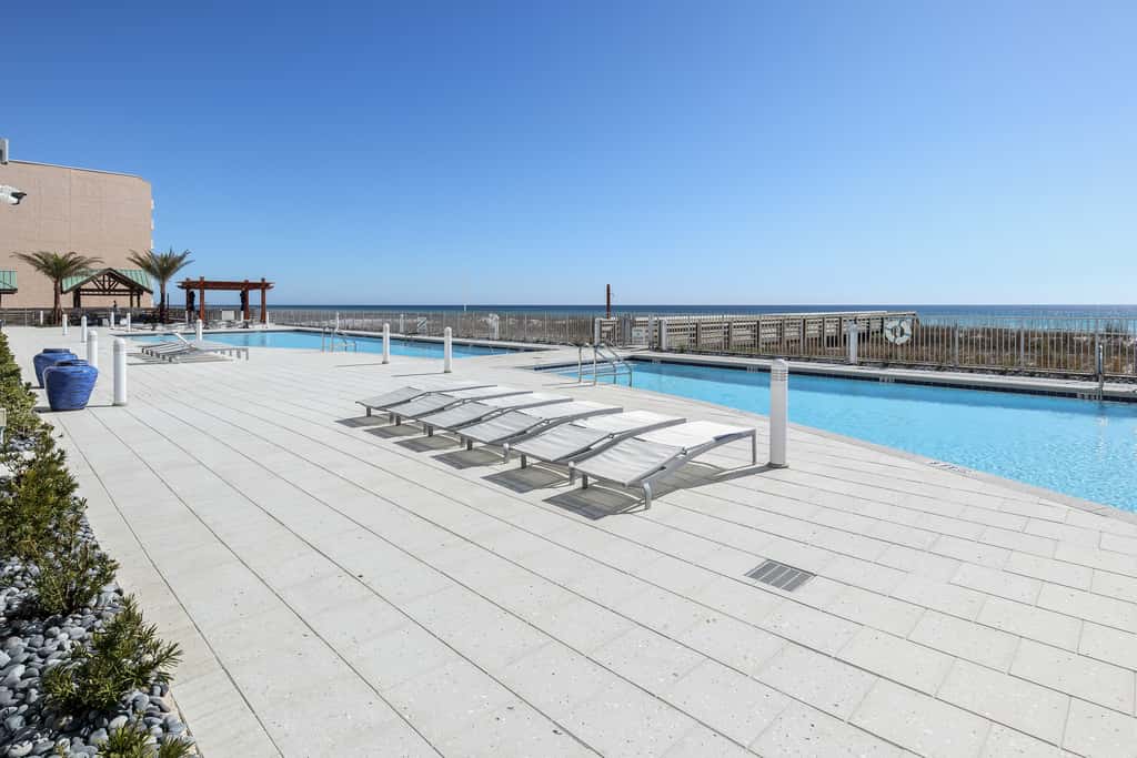 Blu 105 - Gulf-front condo with pools and seasonal beach service in a gated community