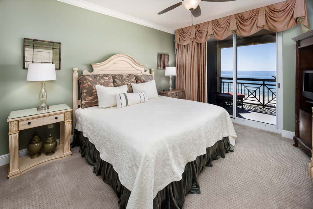 Gulf-view condo with beachfront access, pool, hot tub, gym, AC, & washer&dryer