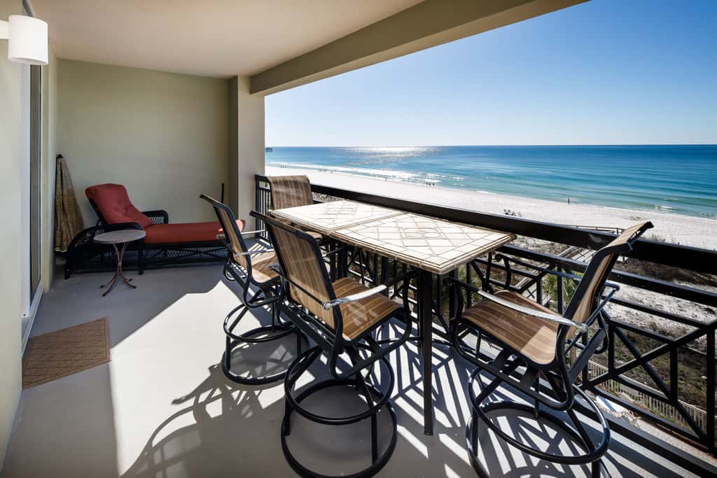 Gulf-view condo with beachfront access, pool, hot tub, gym, AC, & washer&dryer