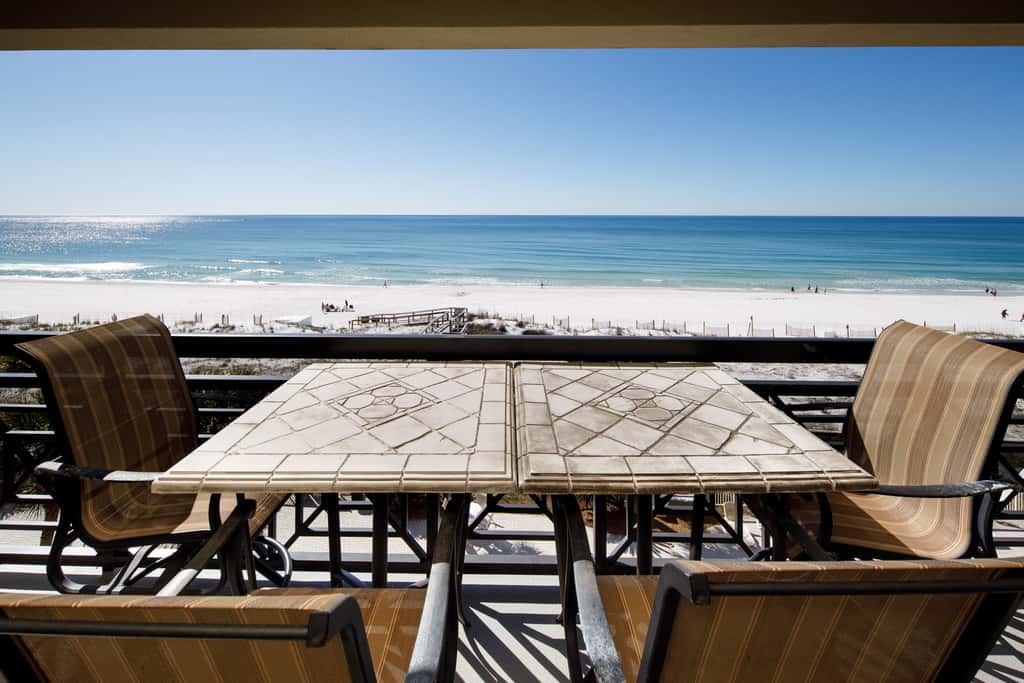 Gulf-view condo with beachfront access, pool, hot tub, gym, AC, & washer&dryer