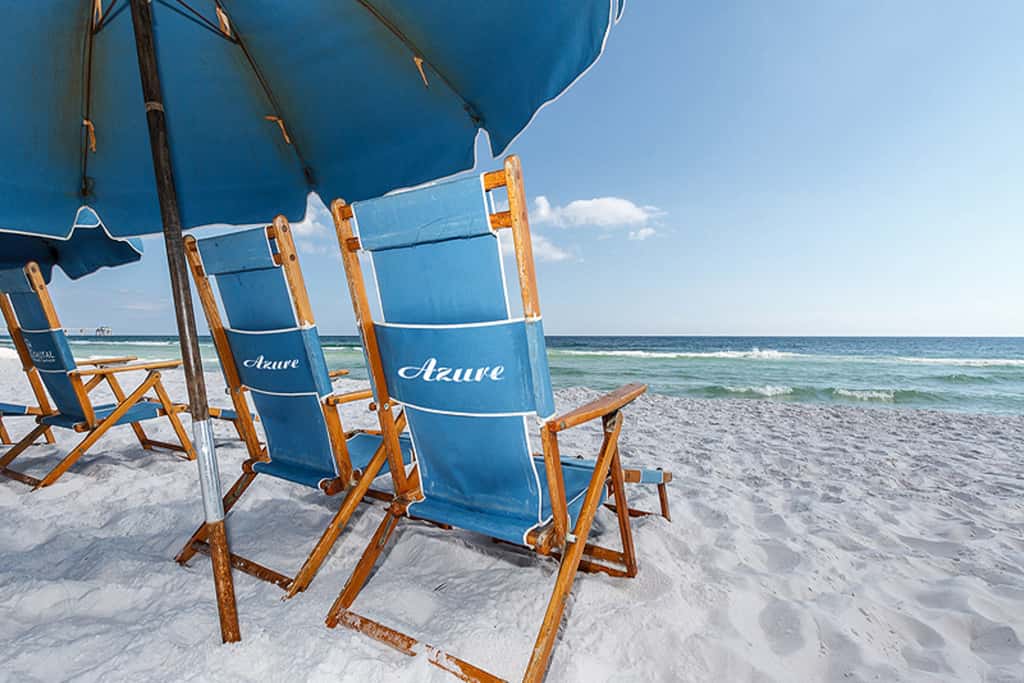 Gulf-view condo with beachfront access, pool, hot tub, gym, AC, & washer&dryer