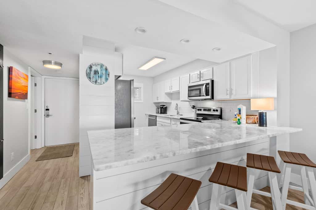 Sunny, beachfront condo with shared pool, free WiFi, & Gulf views
