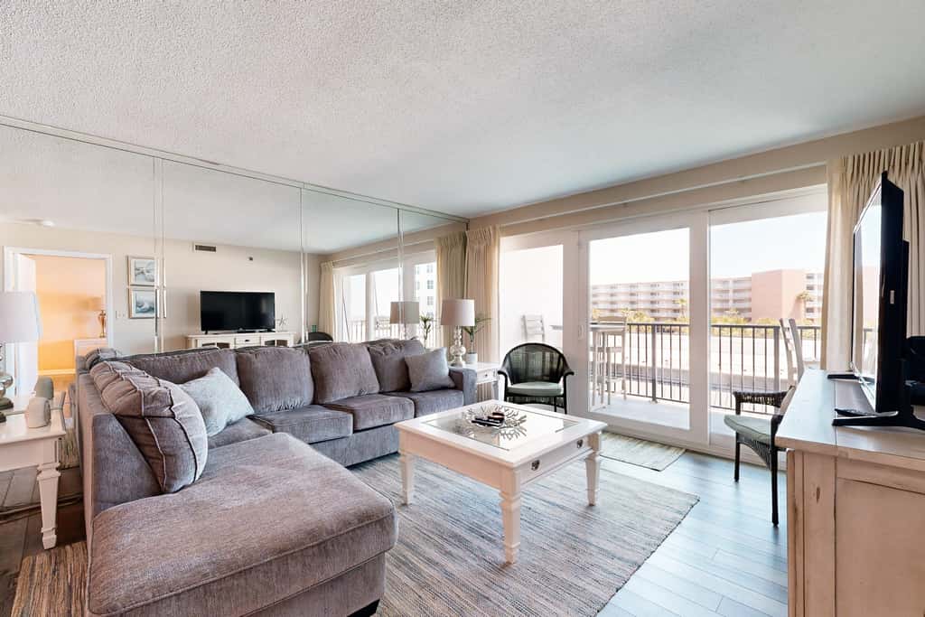Beachfront condo with Gulf views, beach access, pool, & private balcony
