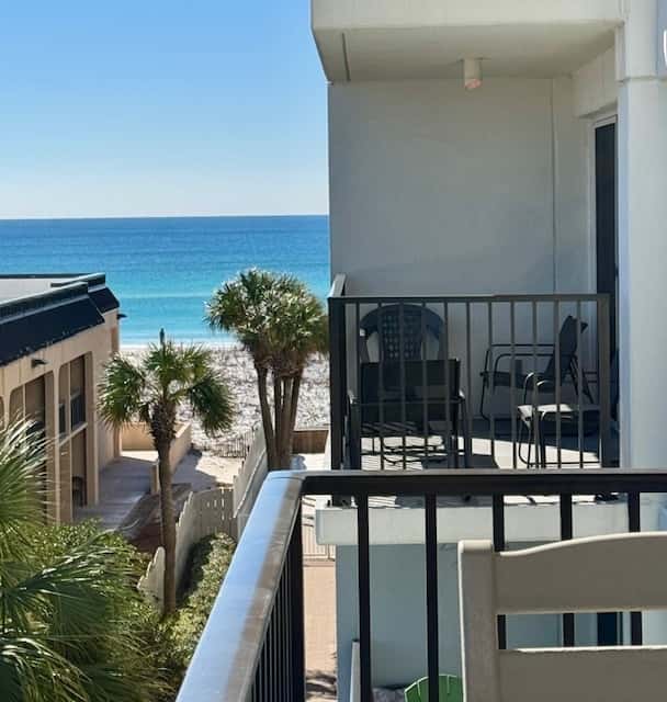 Beachfront condo with Gulf views, beach access, pool, & private balcony