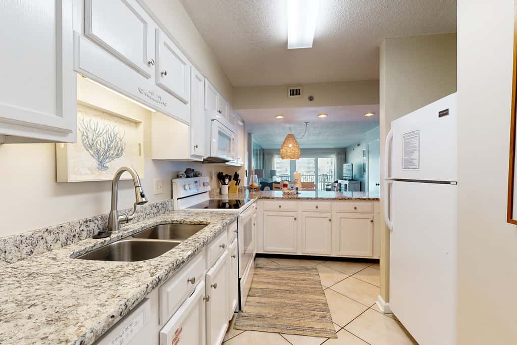 Beachfront condo with Gulf views, beach access, pool, & private balcony