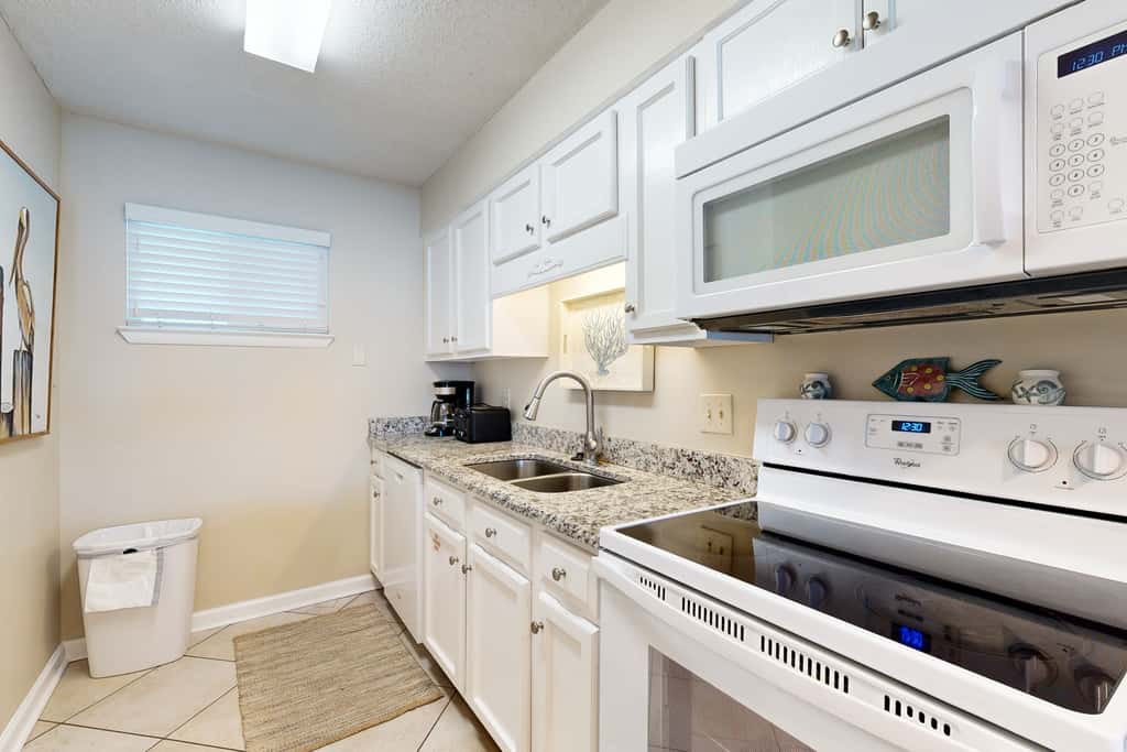 Beachfront condo with Gulf views, beach access, pool, & private balcony