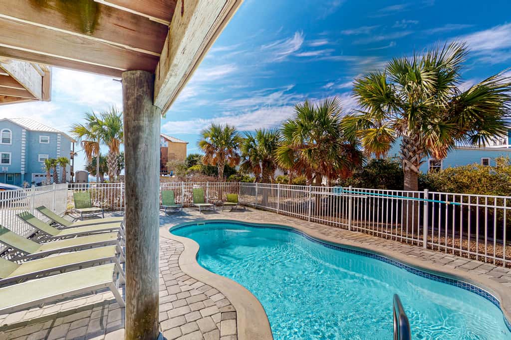 Dog-friendly beach house with a private pool, firepit, AC, & washer&dryer