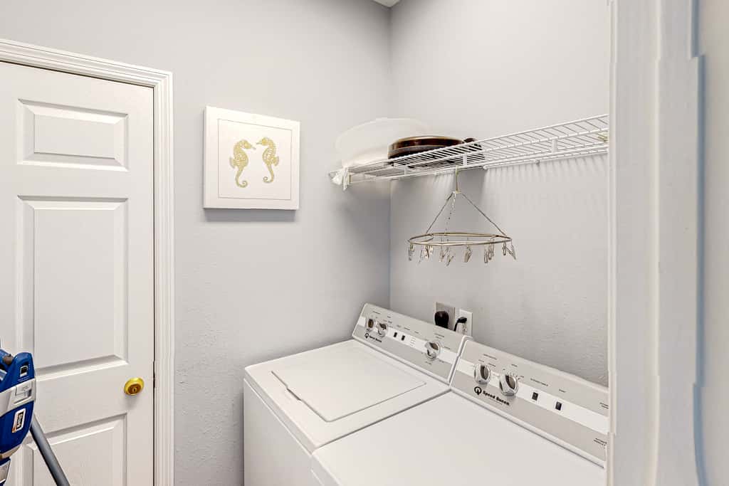 Dog-friendly beach house with a private pool, firepit, AC, & washer&dryer