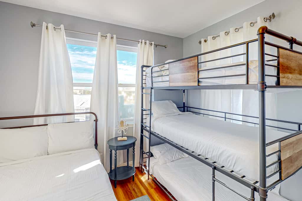Dog-friendly beach house with a private pool, firepit, AC, & washer&dryer