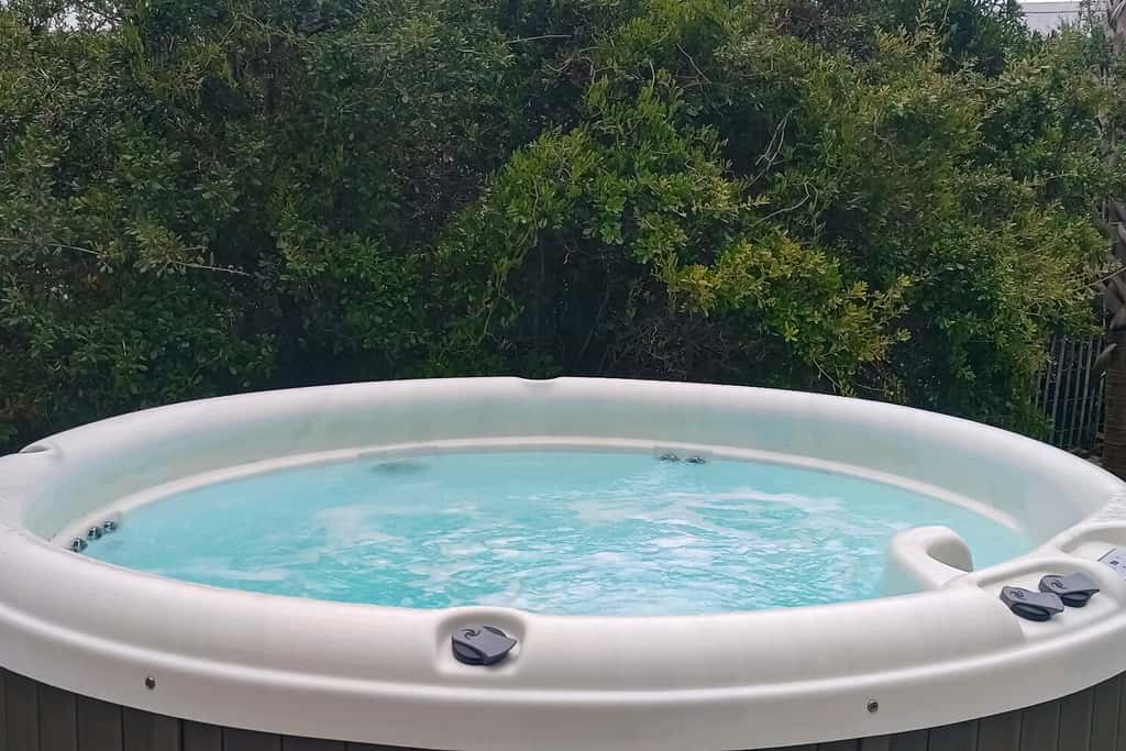 Dog-friendly beach house with a private pool, firepit, AC, & washer&dryer