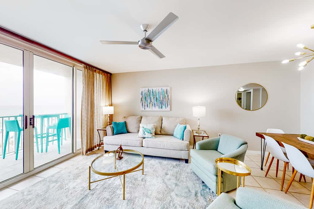 Beachfront condo with pool, hot tub, gym access, balcony