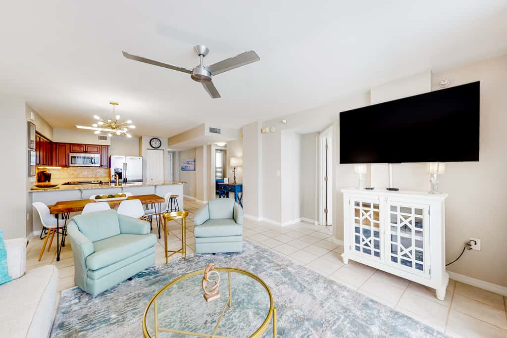 Beachfront condo with pool, hot tub, gym access, balcony