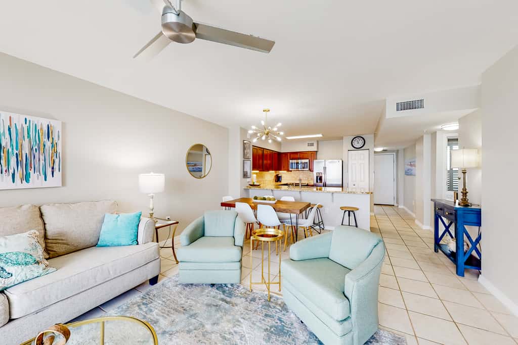 Beachfront condo with pool, hot tub, gym access, balcony