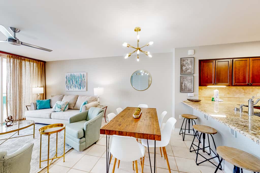 Beachfront condo with pool, hot tub, gym access, balcony