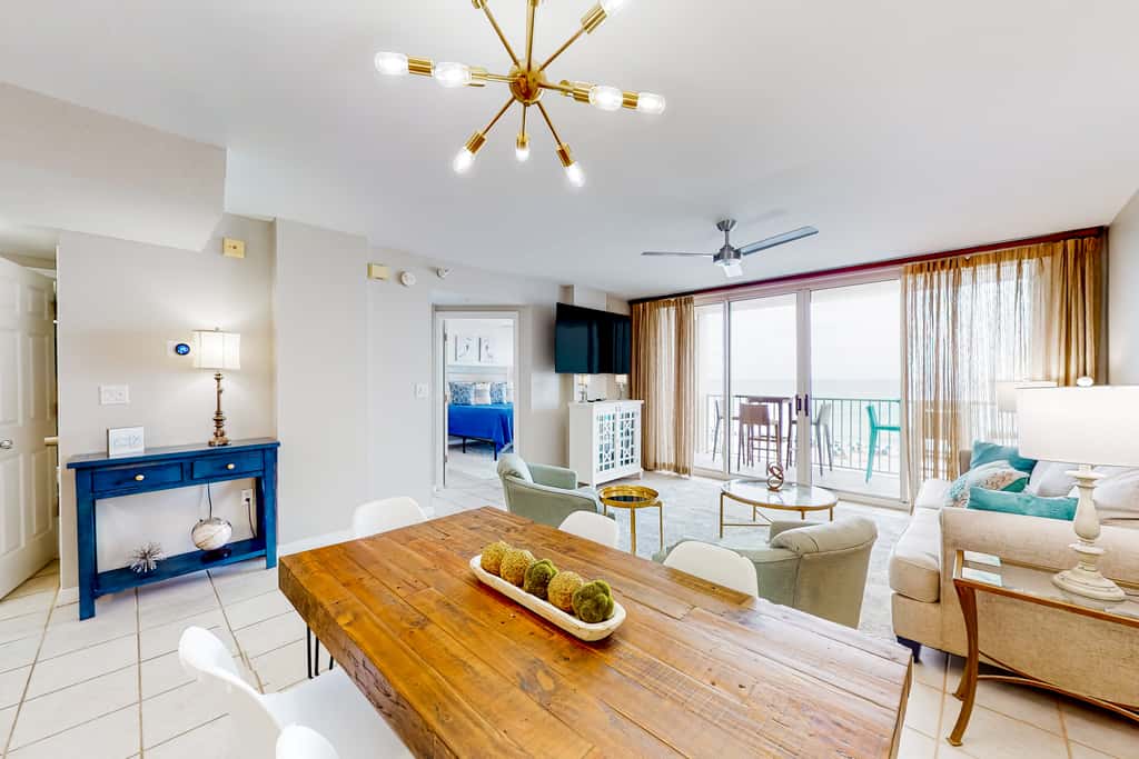 Beachfront condo with pool, hot tub, gym access, balcony