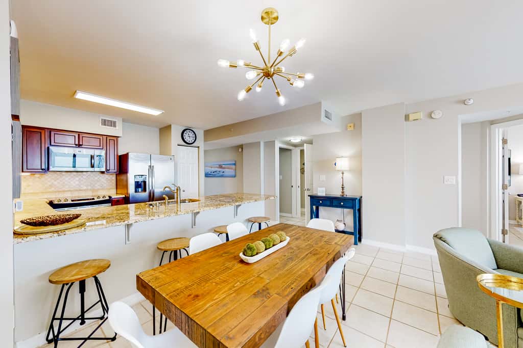 Beachfront condo with pool, hot tub, gym access, balcony