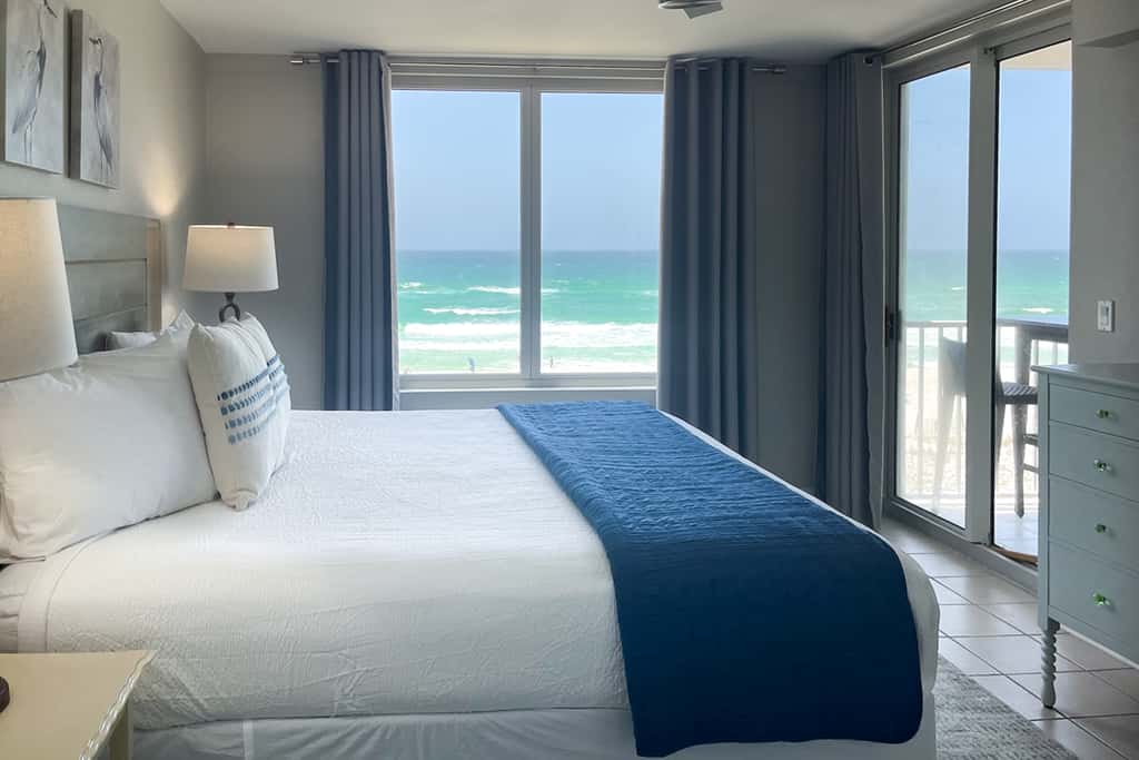 Beachfront condo with pool, hot tub, gym access, balcony