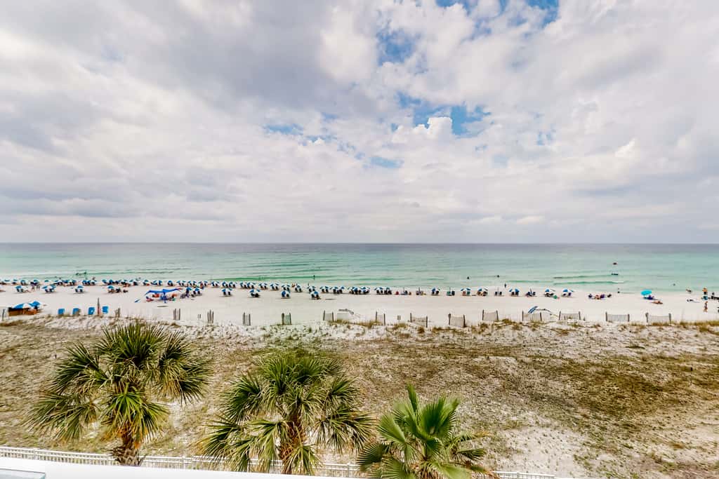 Beachfront condo with pool, hot tub, gym access, balcony