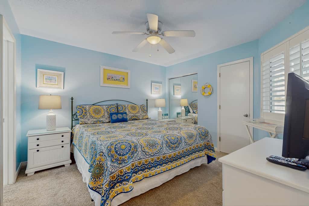 Beautiful seaside condo featuring a sparkling pool and direct beach access