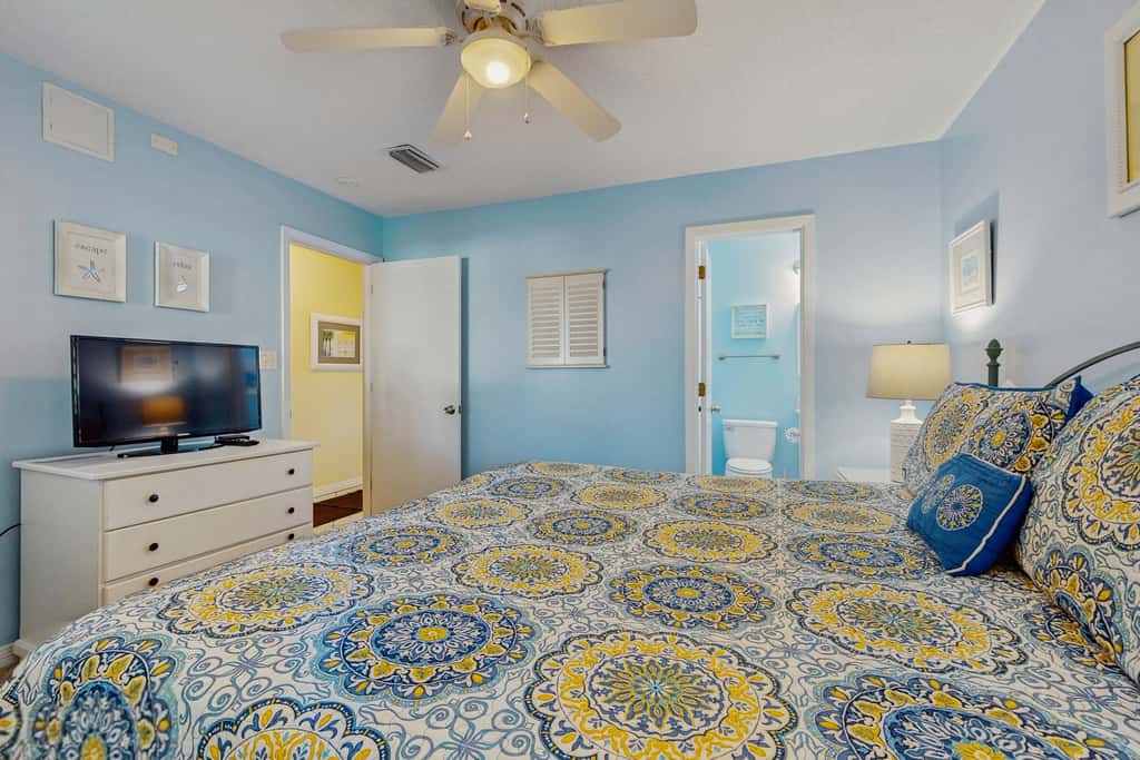 Beautiful seaside condo featuring a sparkling pool and direct beach access