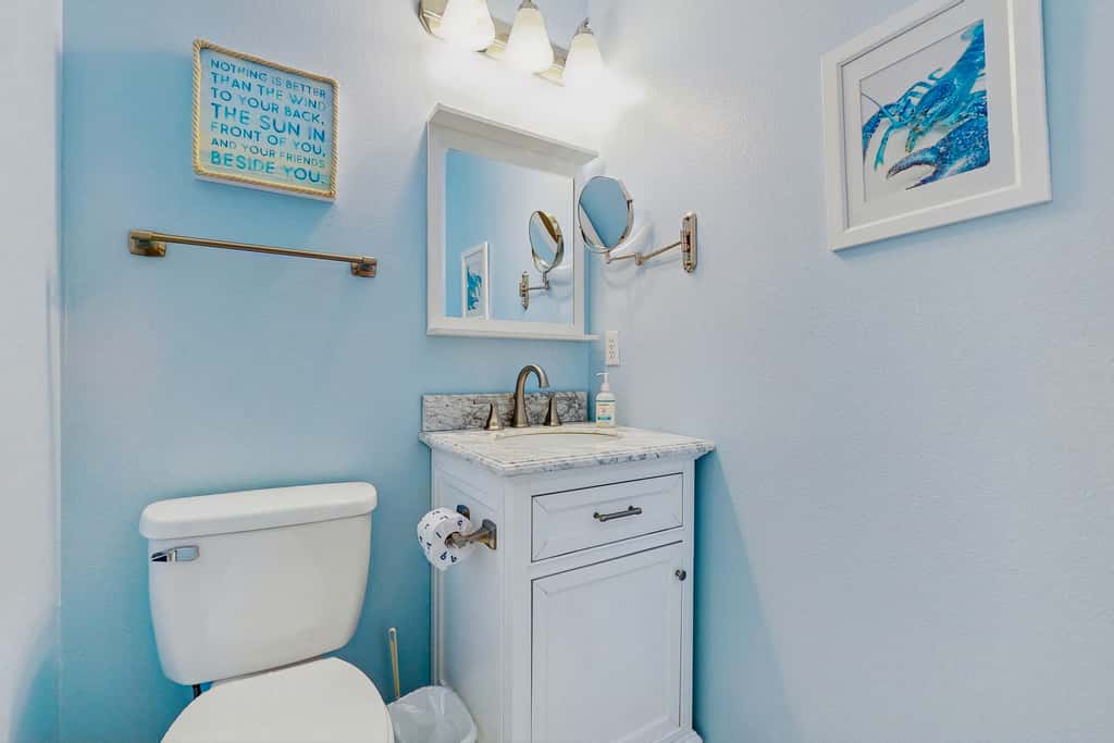 Beautiful seaside condo featuring a sparkling pool and direct beach access