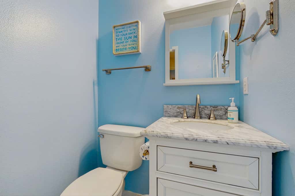 Beautiful seaside condo featuring a sparkling pool and direct beach access