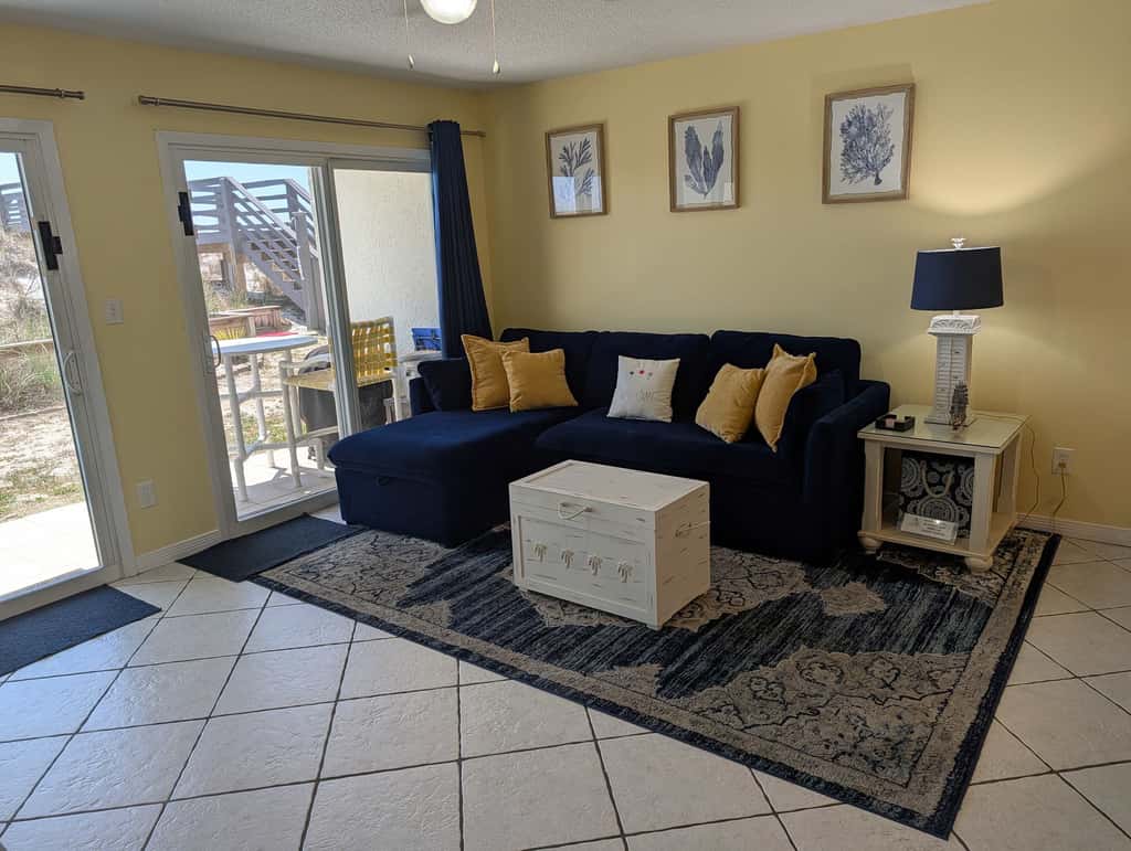 Beautiful seaside condo featuring a sparkling pool and direct beach access