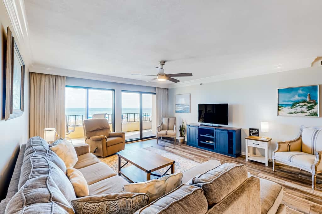 Beachfront resort condo with outdoor pool, Gulf views, balcony, W/D, & AC