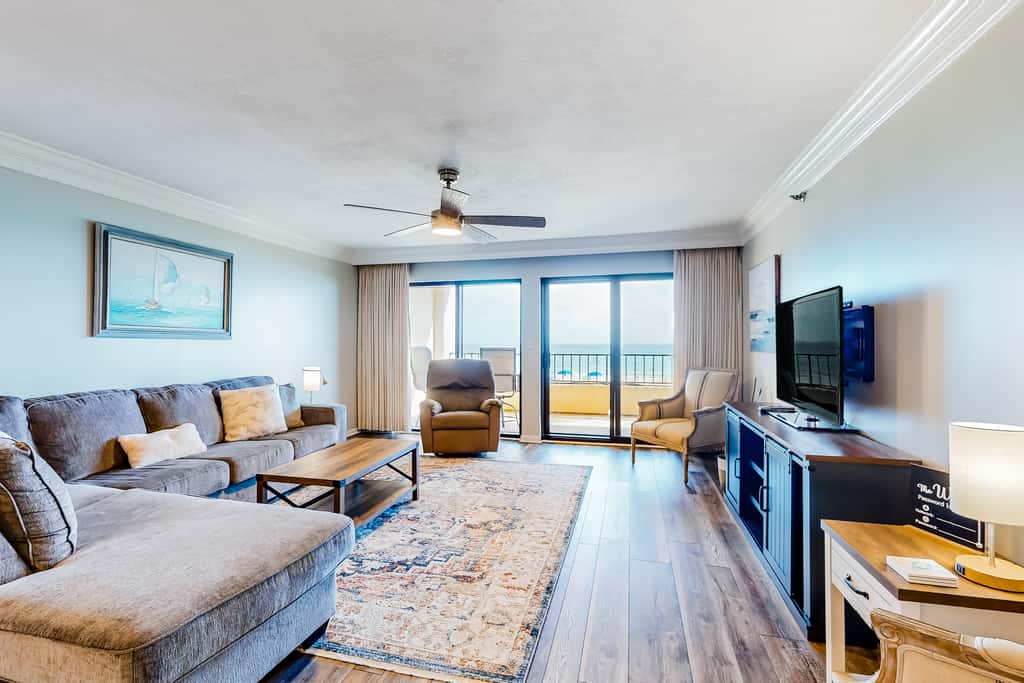 Beachfront resort condo with outdoor pool, Gulf views, balcony, W/D, & AC
