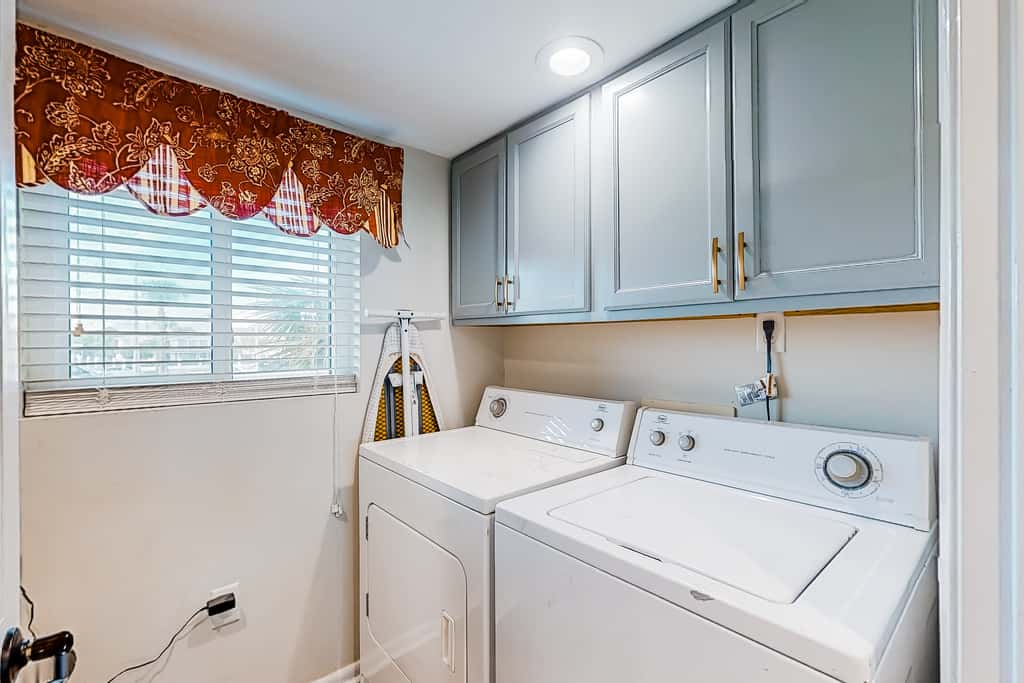 Beachfront resort condo with outdoor pool, Gulf views, balcony, W/D, & AC
