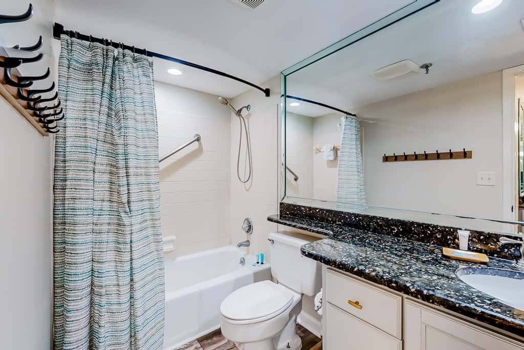 Beachfront resort condo with outdoor pool, Gulf views, balcony, W/D, & AC