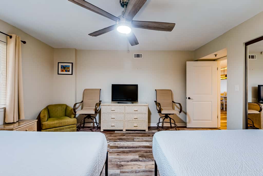 Beachfront resort condo with outdoor pool, Gulf views, balcony, W/D, & AC