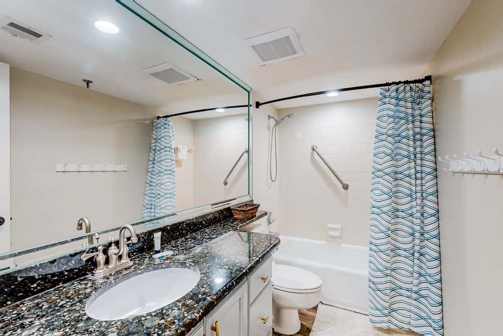 Beachfront resort condo with outdoor pool, Gulf views, balcony, W/D, & AC