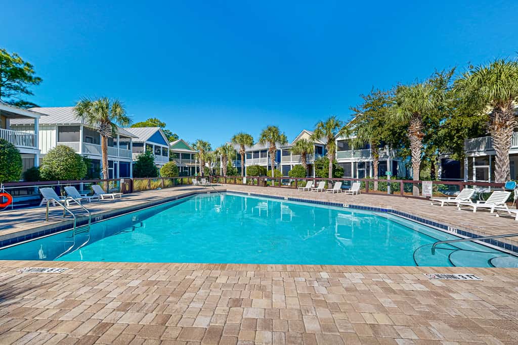 Dog-friendly 2BR home with screened porch, pool, & hot tub - beach access one mile away - snowbirds welcome