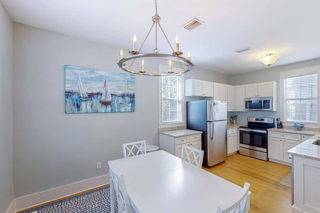 Dog-friendly 2BR home with screened porch, pool, & hot tub - beach access one mile away - snowbirds welcome