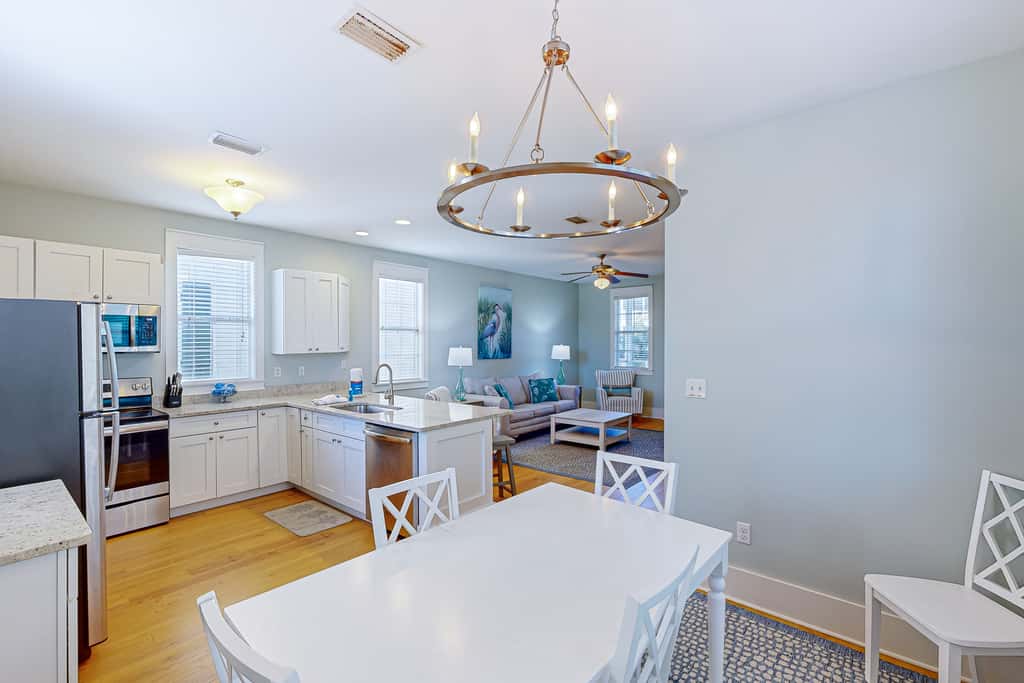 Dog-friendly 2BR home with screened porch, pool, & hot tub - beach access one mile away - snowbirds welcome