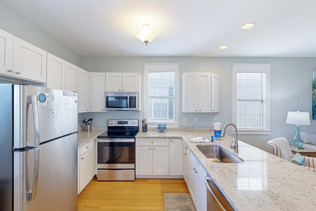 Dog-friendly 2BR home with screened porch, pool, & hot tub - beach access one mile away - snowbirds welcome