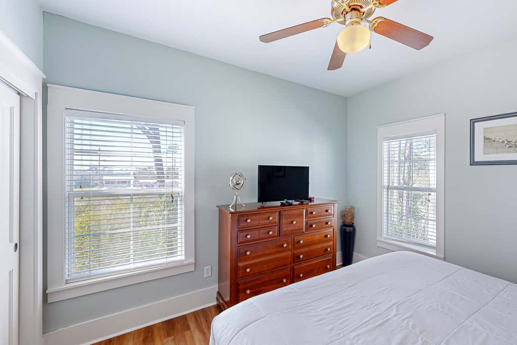 Dog-friendly 2BR home with screened porch, pool, & hot tub - beach access one mile away - snowbirds welcome