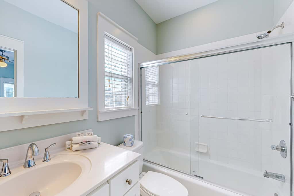 Dog-friendly 2BR home with screened porch, pool, & hot tub - beach access one mile away - snowbirds welcome