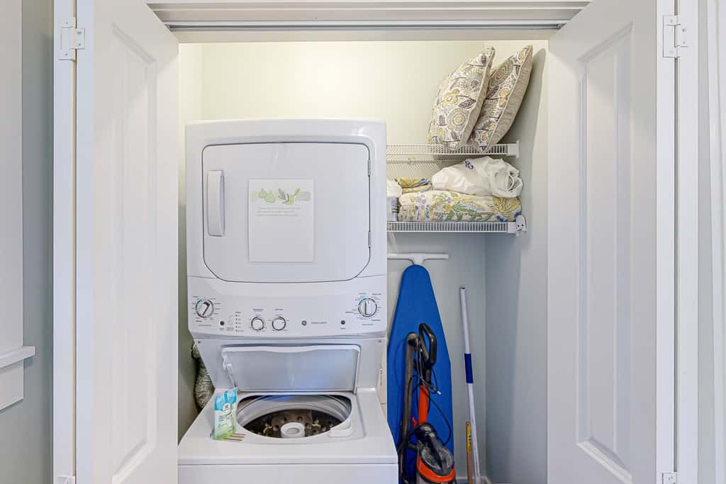 Dog-friendly 2BR home with screened porch, pool, & hot tub - beach access one mile away - snowbirds welcome