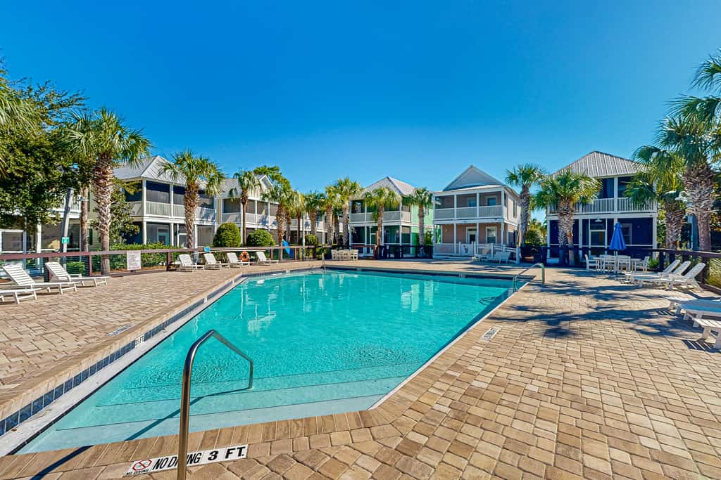Dog-friendly 2BR home with screened porch, pool, & hot tub - beach access one mile away - snowbirds welcome