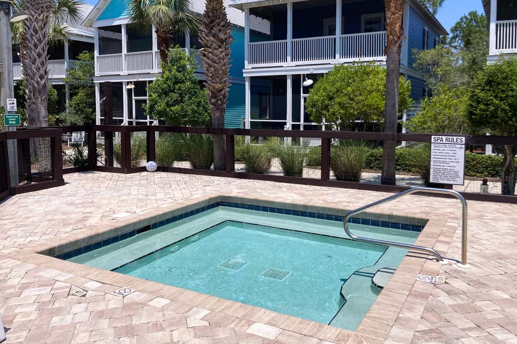 Dog-friendly 2BR home with screened porch, pool, & hot tub - beach access one mile away - snowbirds welcome
