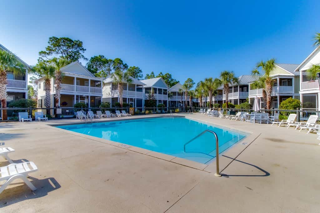 Dog-friendly 2BR home with screened porch, pool, & hot tub - beach access one mile away - snowbirds welcome