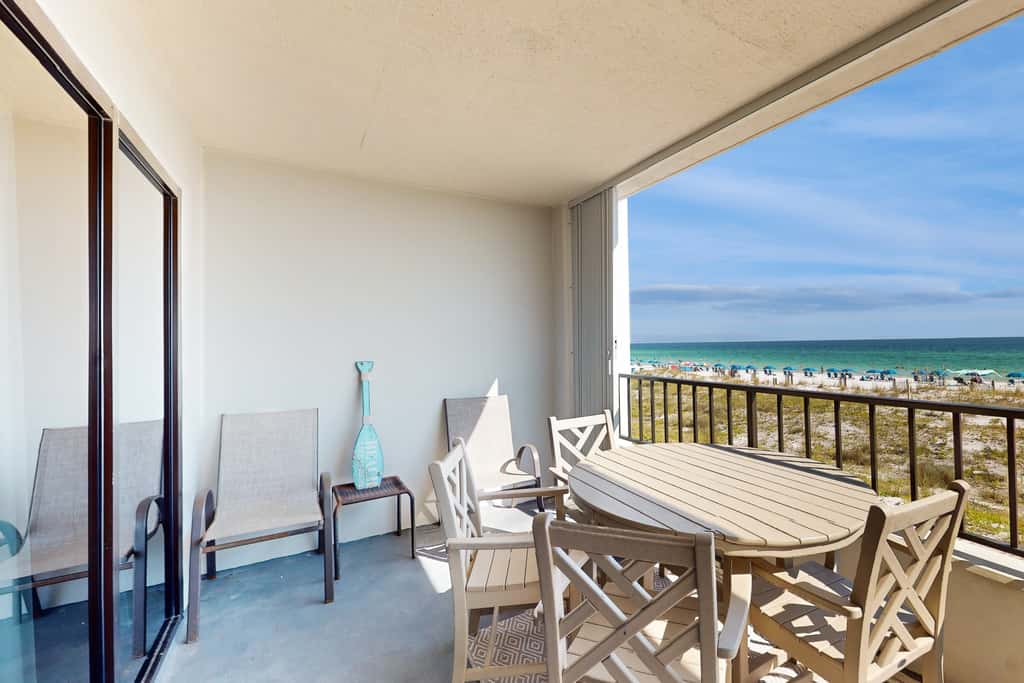 Beachfront condo with Gulf views, pool, tennis, gym, & private balcony