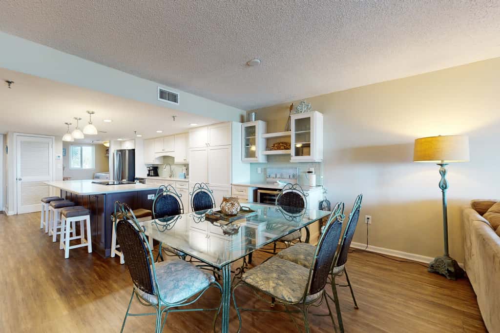 Beachfront condo with Gulf views, pool, tennis, gym, & private balcony