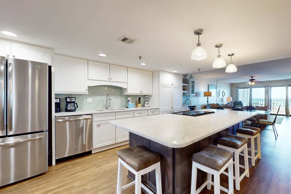 Beachfront condo with Gulf views, pool, tennis, gym, & private balcony