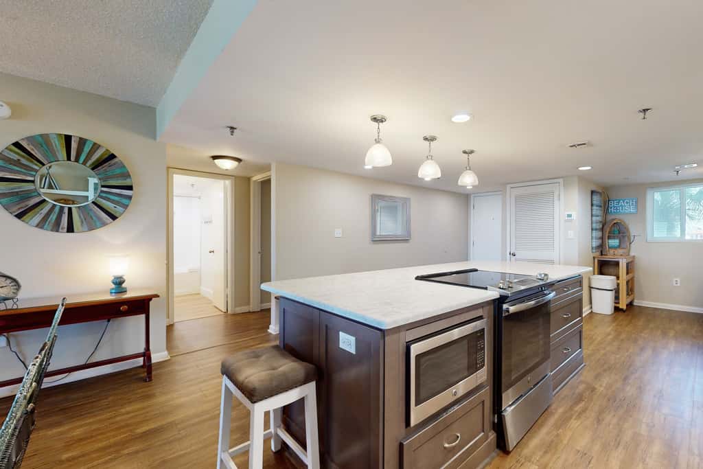 Beachfront condo with Gulf views, pool, tennis, gym, & private balcony