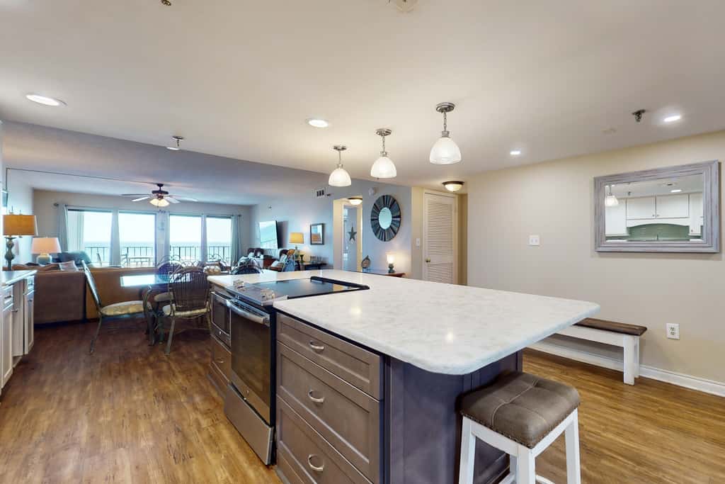 Beachfront condo with Gulf views, pool, tennis, gym, & private balcony